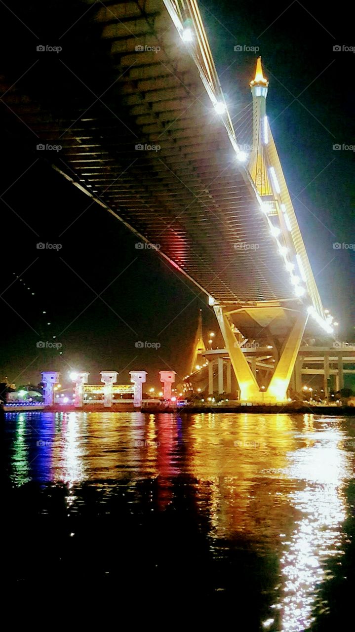 Cable suspension bridge across the Chao Phraya River. Bangkok. Thailand.