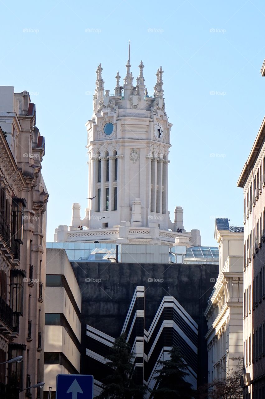 Street art with Palacio de Cibeles in the background, Madrid, Spain 