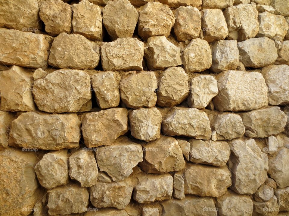 Rock Wall. Wall of rocks at archaeological site. 