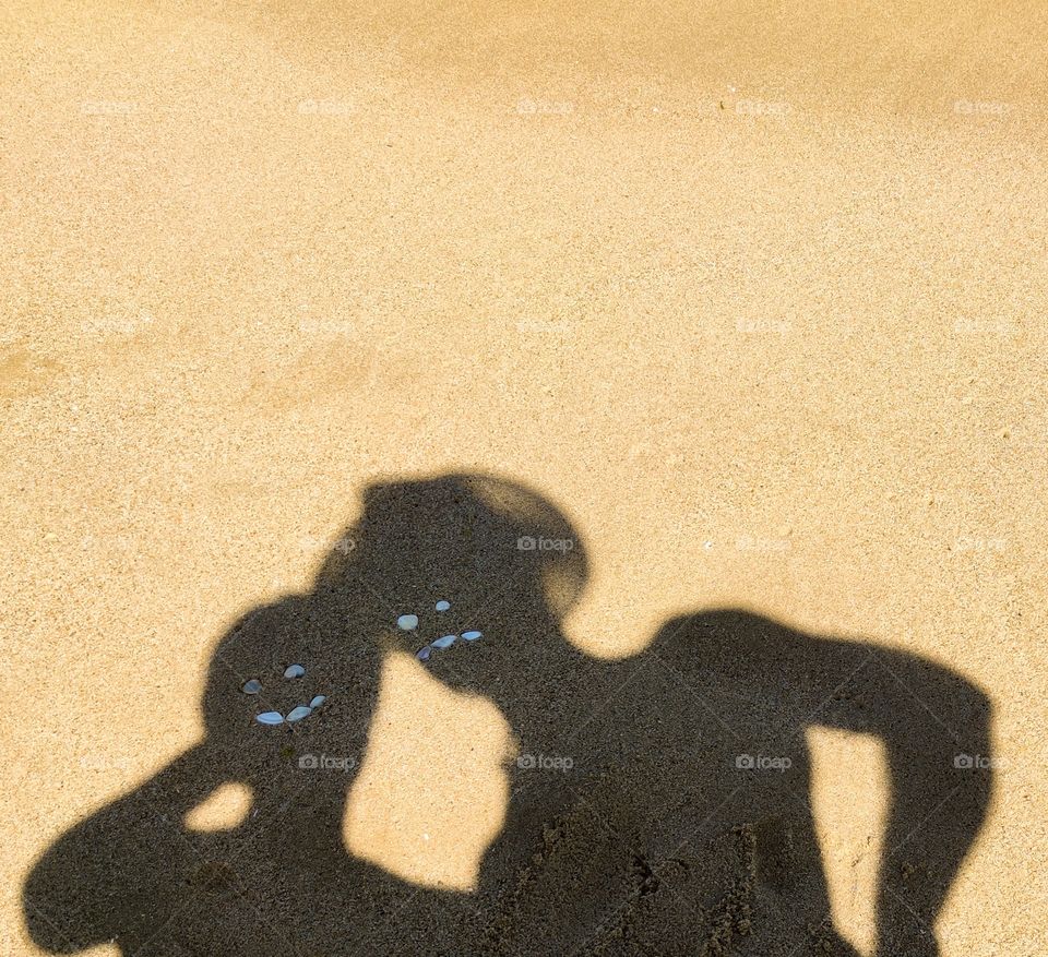 Funny shadows on the beach