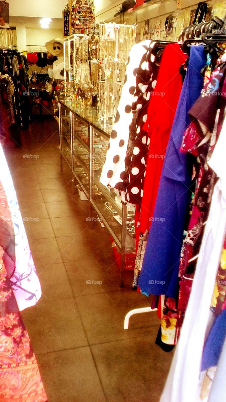 Shop or bazaar or boutique with 
diverse traditional accessories and
beautiful women mannequin in the corner