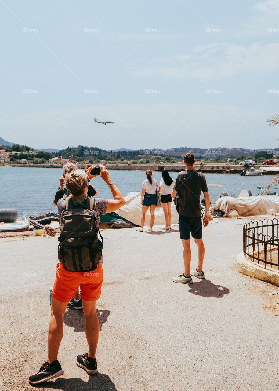 watch a passing plane