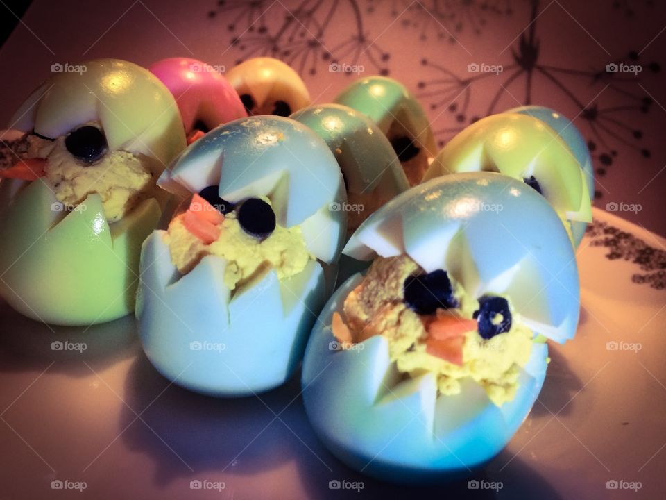 Deviled eggs dressed up for Easter as baby chicks just hatching. Yummy variation on the traditional tasty appetizer. Glad I got the pic as they were devoured in no time flat. And they all asked, "what is that extra tang I taste?" It was horseradish!