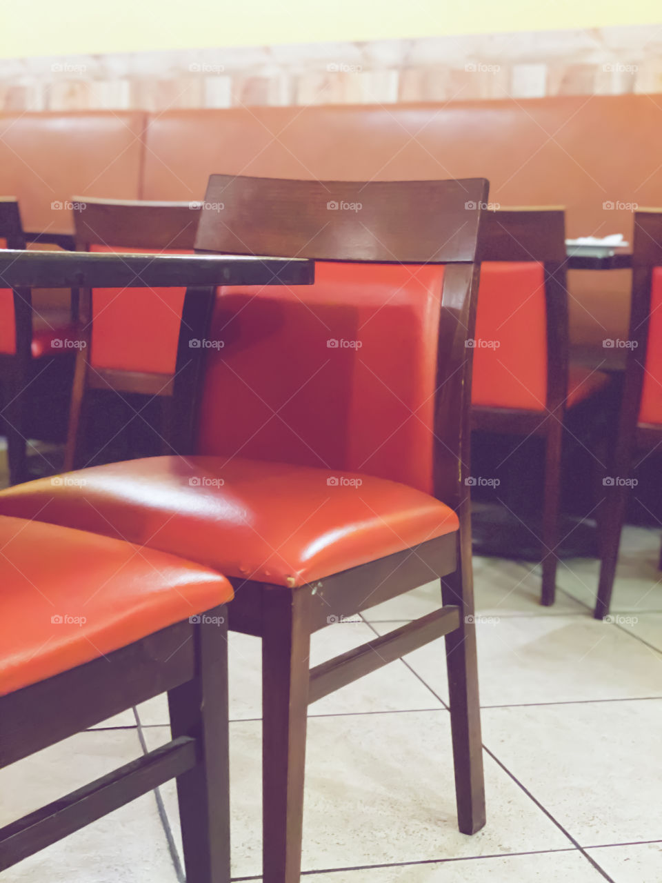 Leather chairs and table in the restaurant 