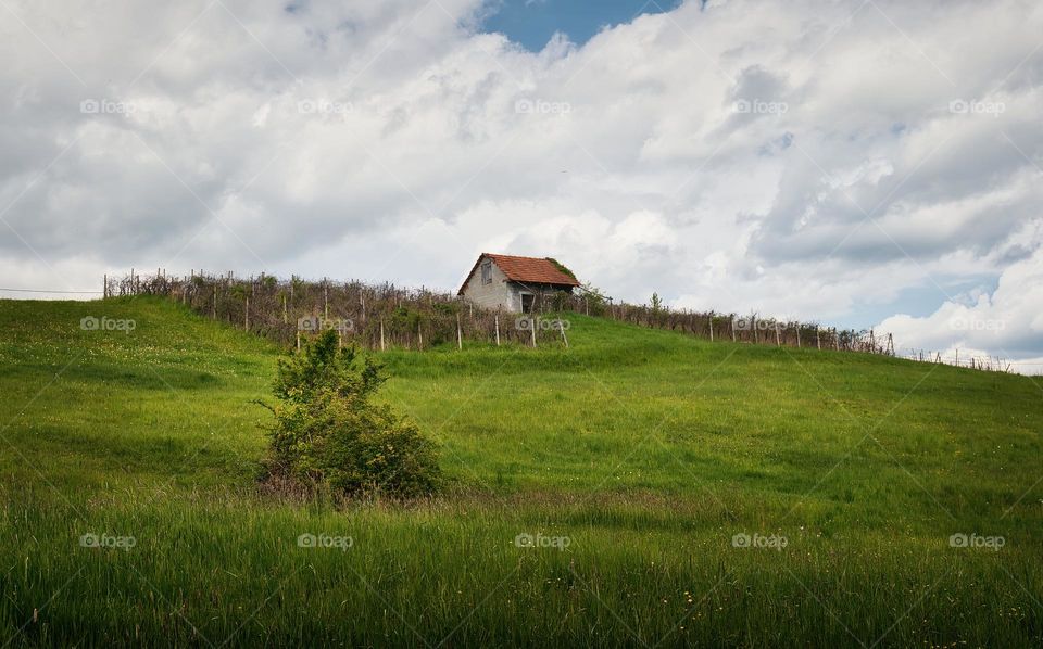 Beautiful scenery with house on green meadow at Klenice, Croatia, county hrvatsko zagorje