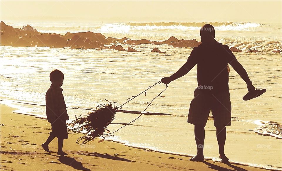 Father and son beach time 