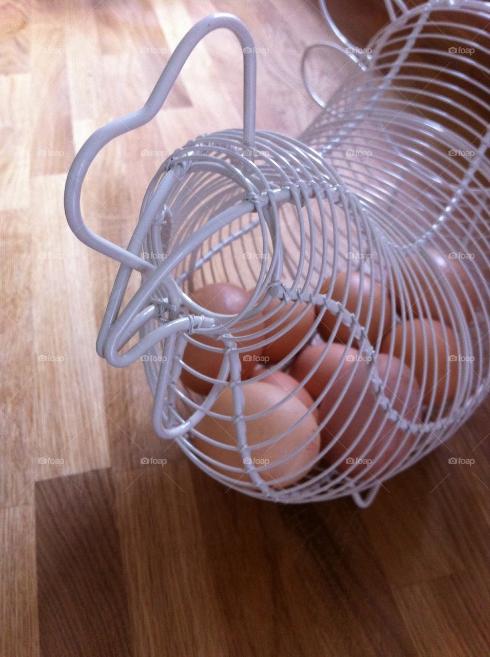 Wire chicken full of eggs