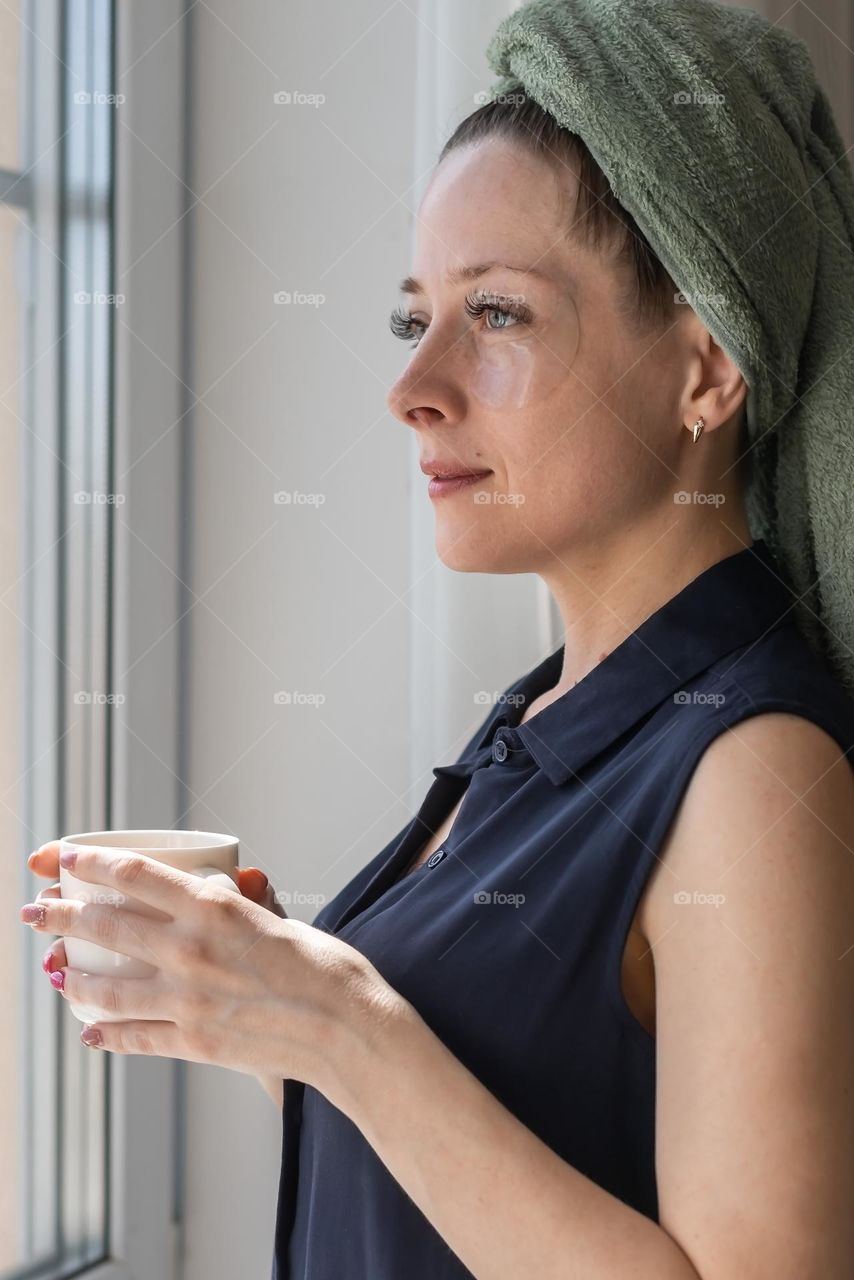 woman relaxing at home with coffee 