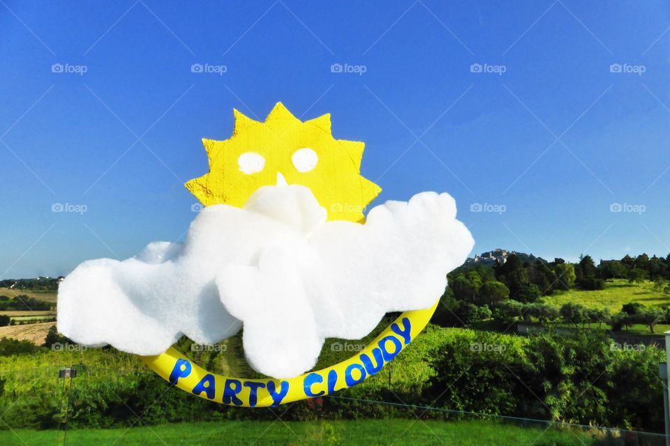 Cartoon forecast of today. Some clouds under the sun on my Village 