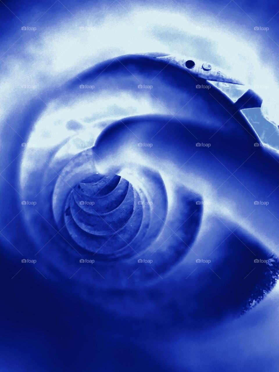 Spiraling down the hole