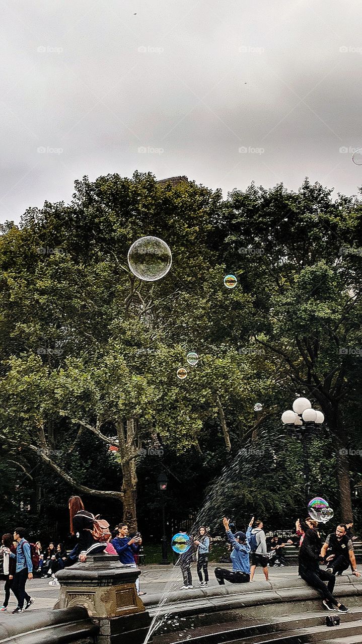 Bubbles Floating Over Washington Square, NYC