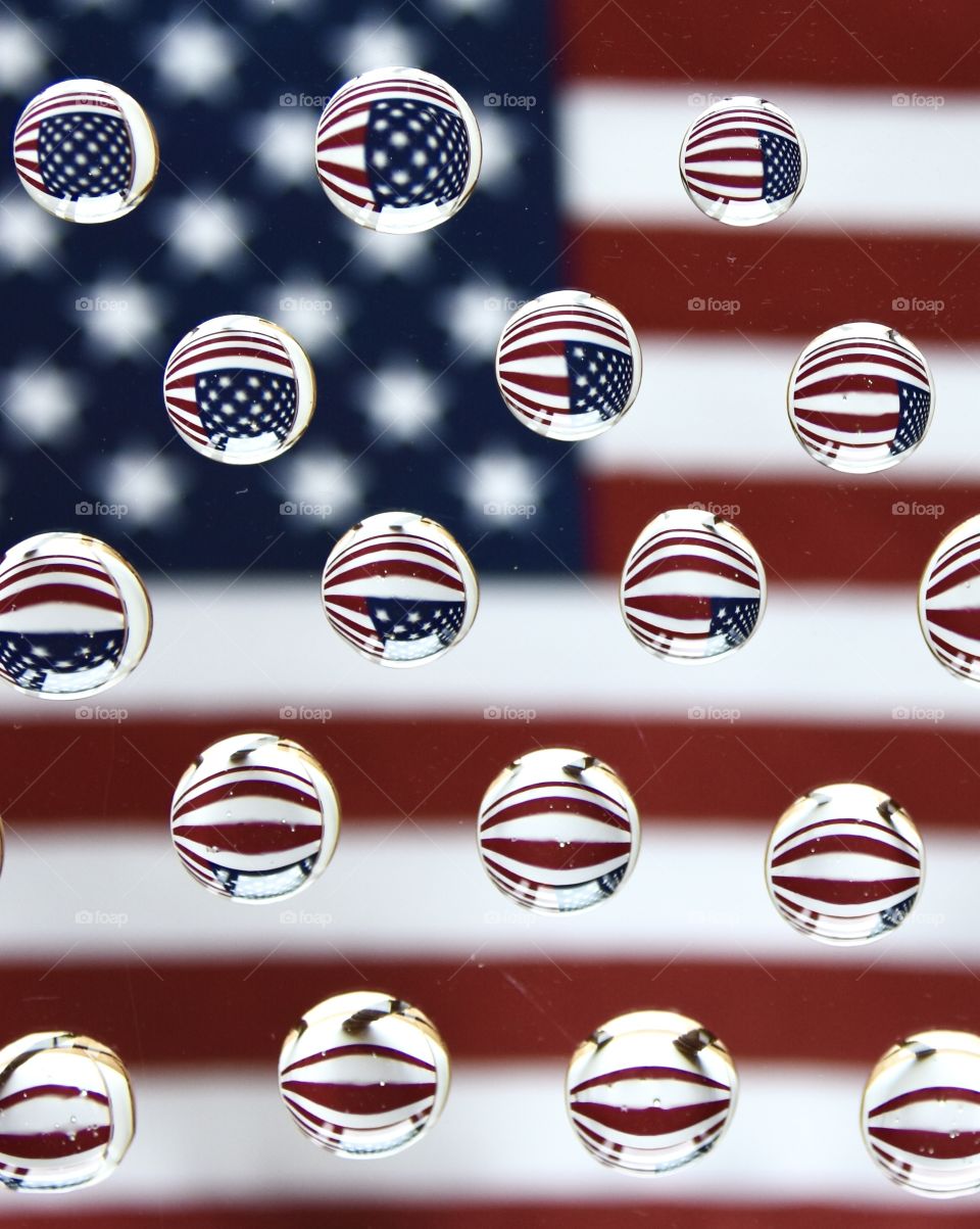 USA Flag with water droplets showing the flag through the drops, abstract 