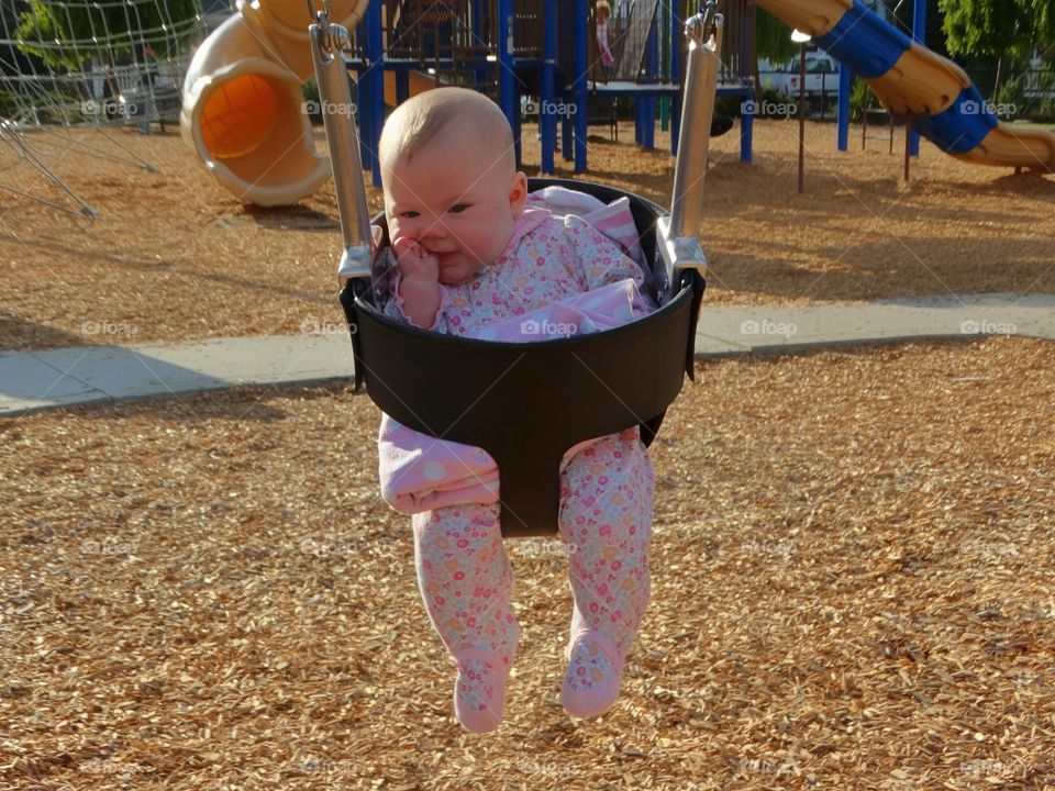 Baby In A Swing
