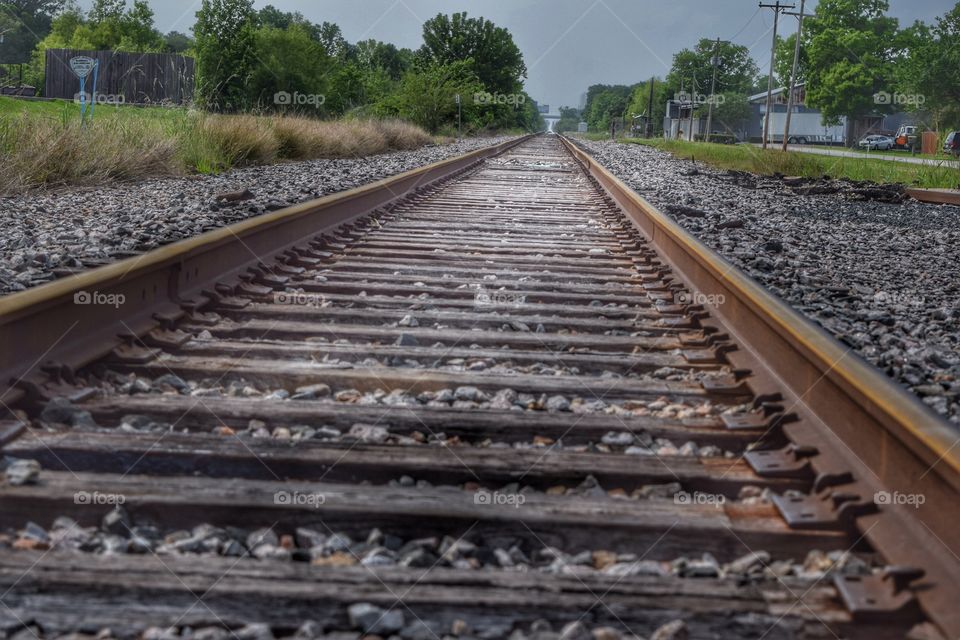 Vanishing railway track at day