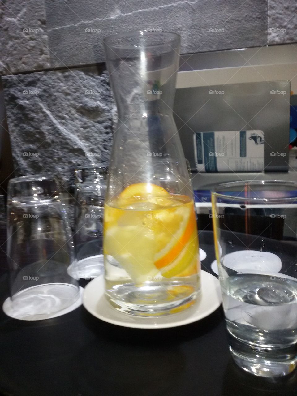 lemon and oranges in the glass