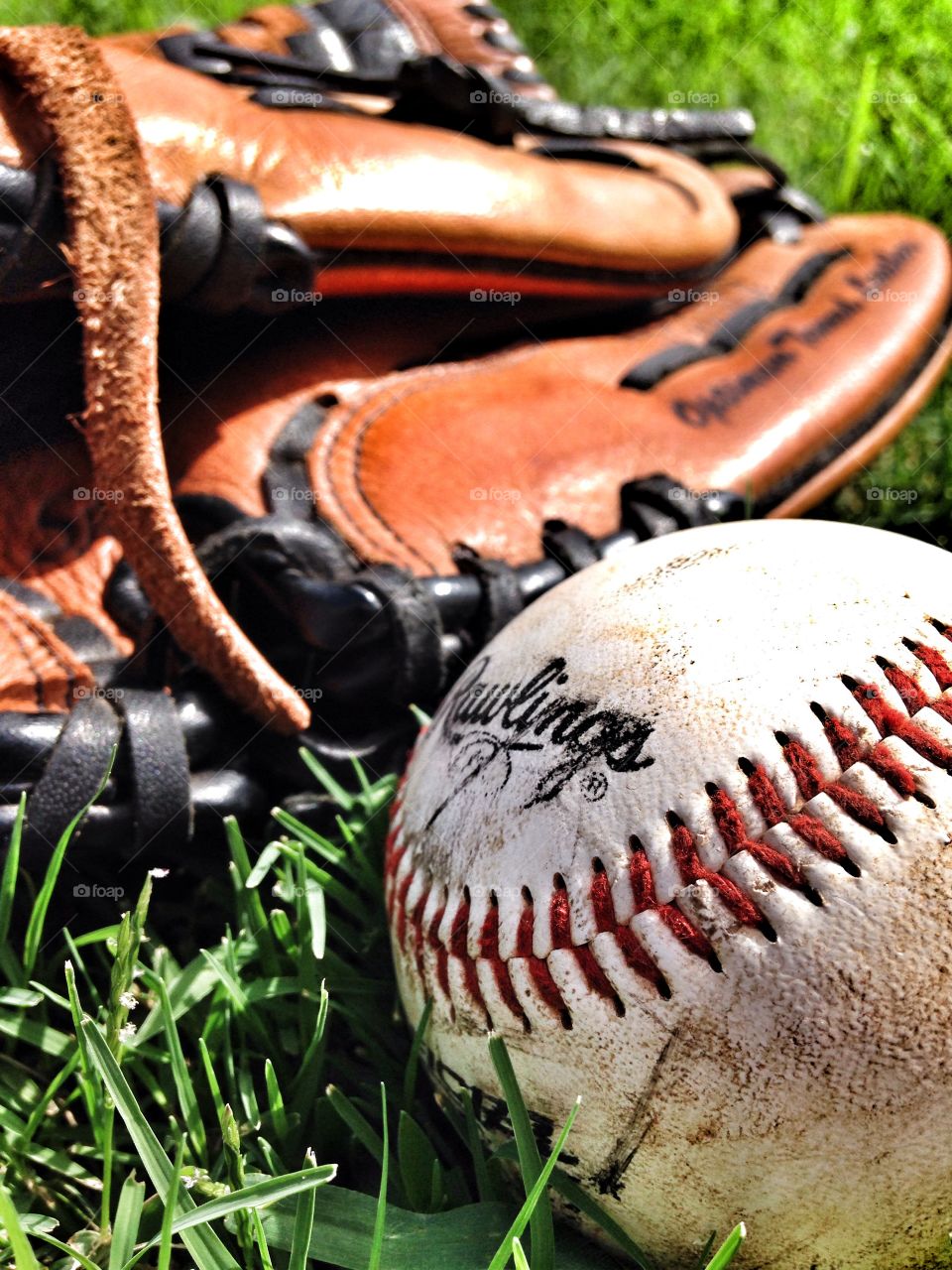 Catch of the game. Rawlings glove and baseball
