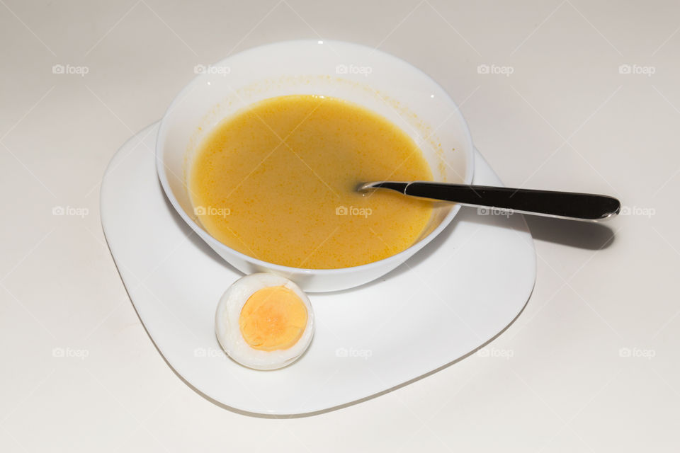 Healthy cream soup if potatoes and carrot and egg 