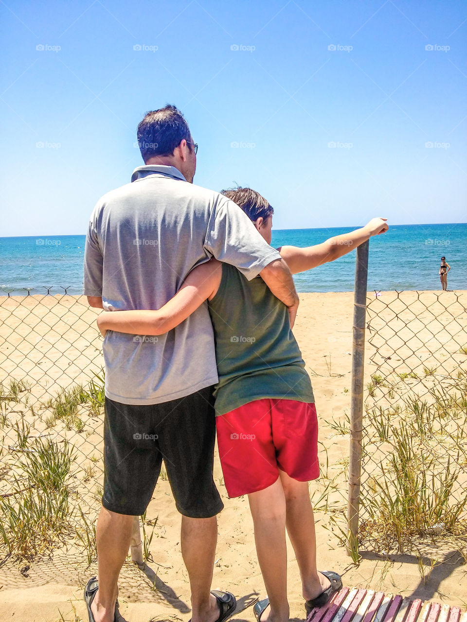 father and son at the beach