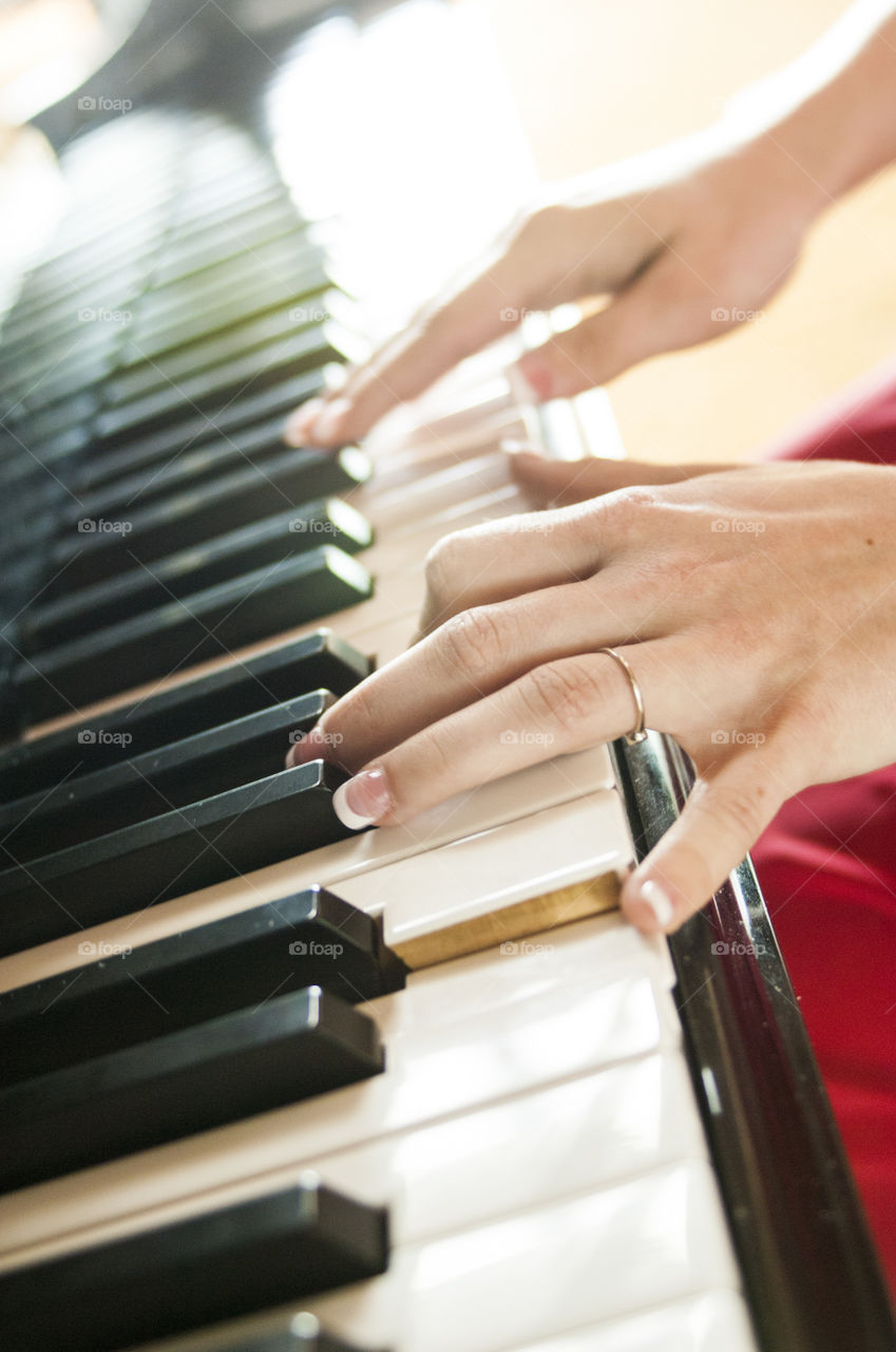 Piano. Hands playing piano