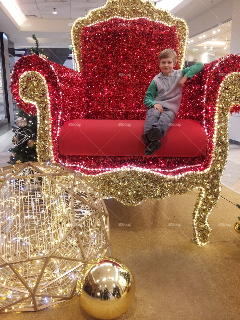 child on Christmas chair