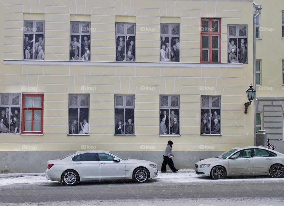 I'm gonna watch you. 
I saw that building in Tartu, Estonia. It situated close to the Tartu University. I found it interesting. Those two white cars are looking good too. 