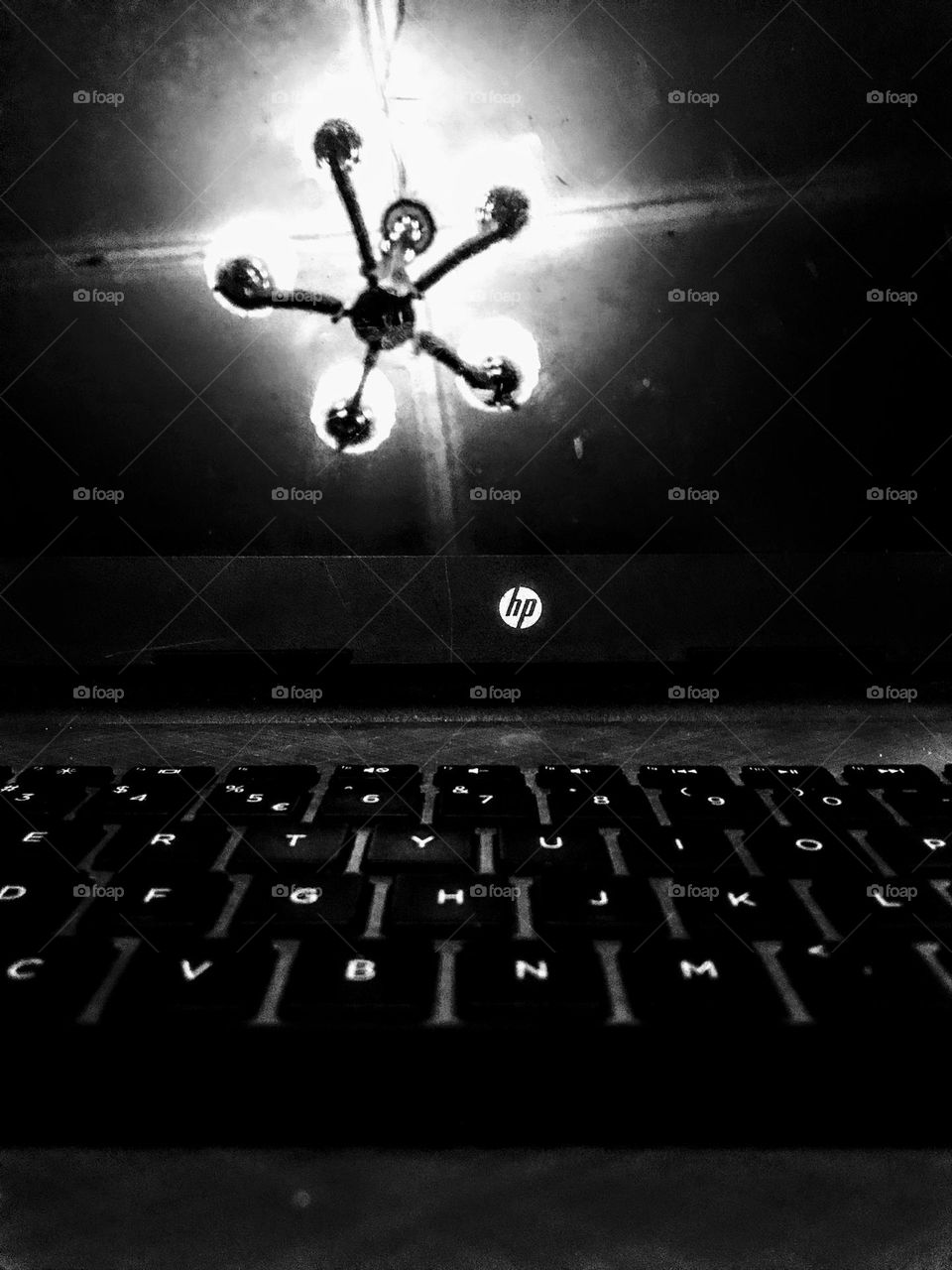 chandelier reflection on my laptop, saw the sense of a beautiful image coming out from taking a shot of it