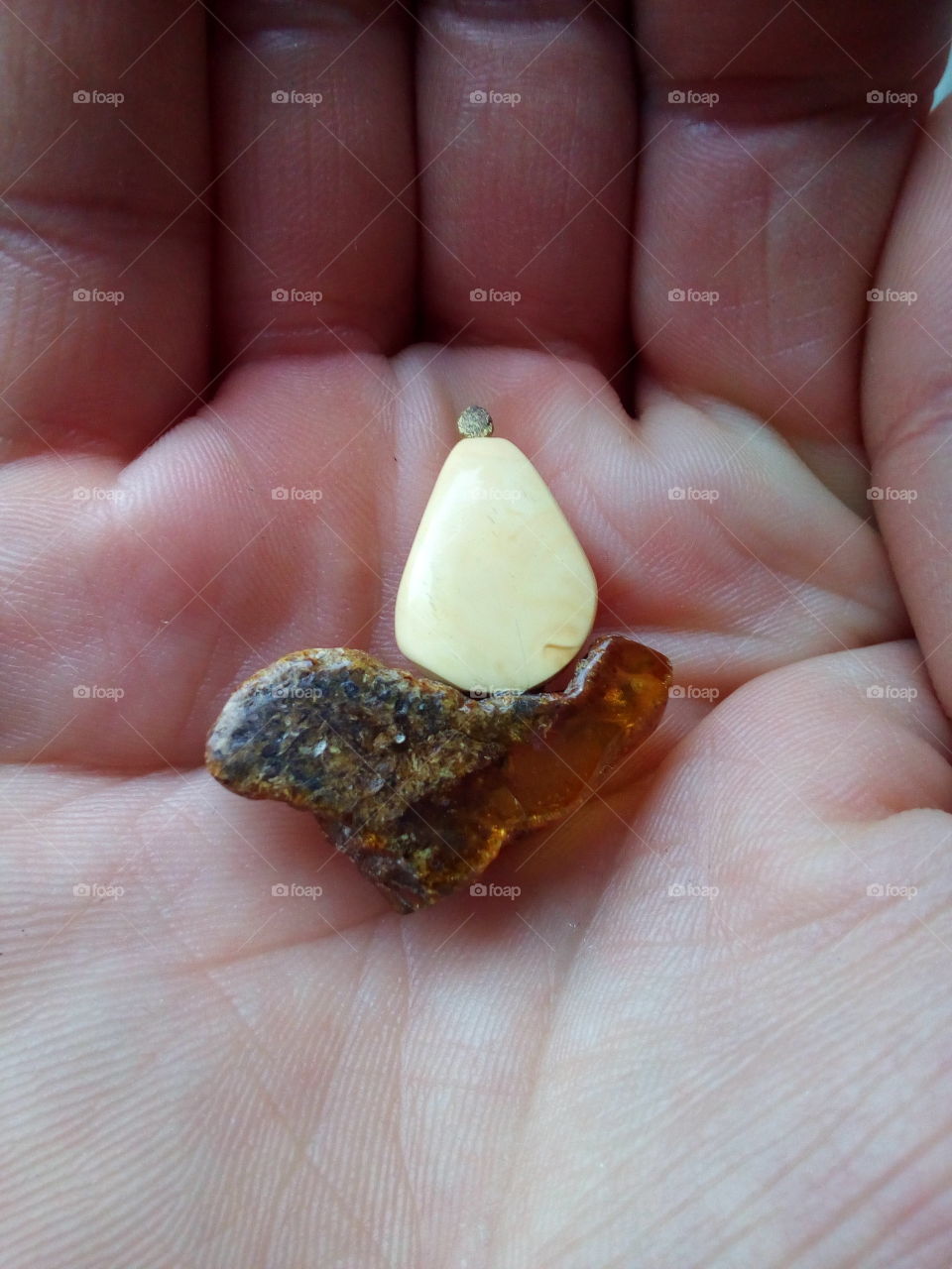 Baltic amber ship brooch in my palm