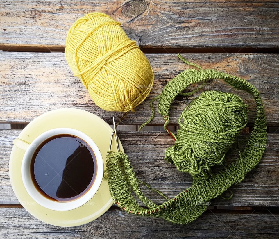 knitting and drinking coffee