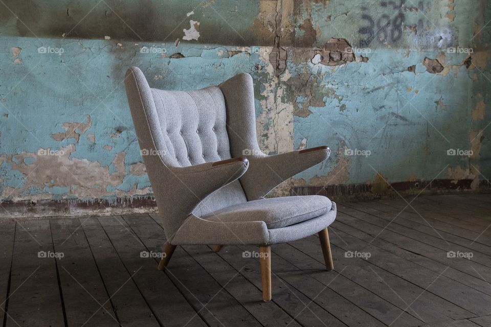 Chair in abandoned warehouse
