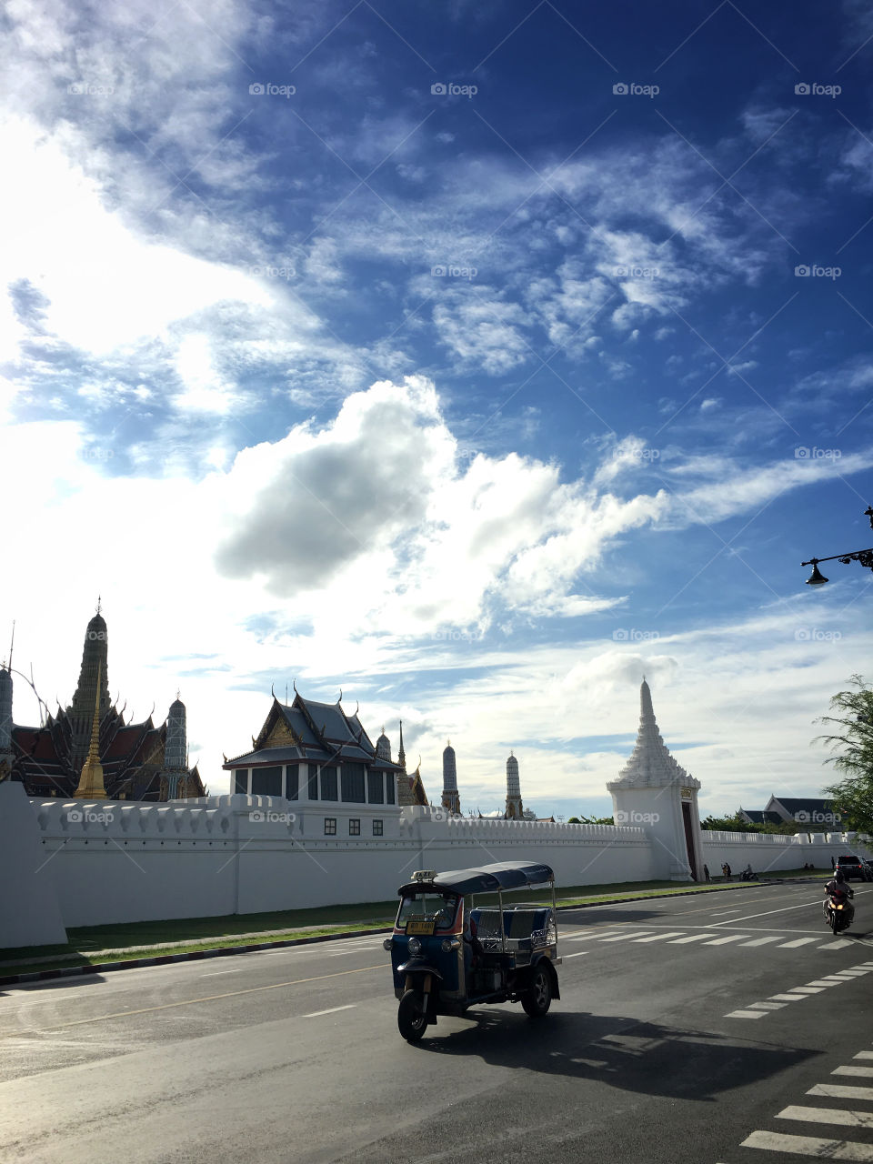 Grand palace with Tuk Tuk car