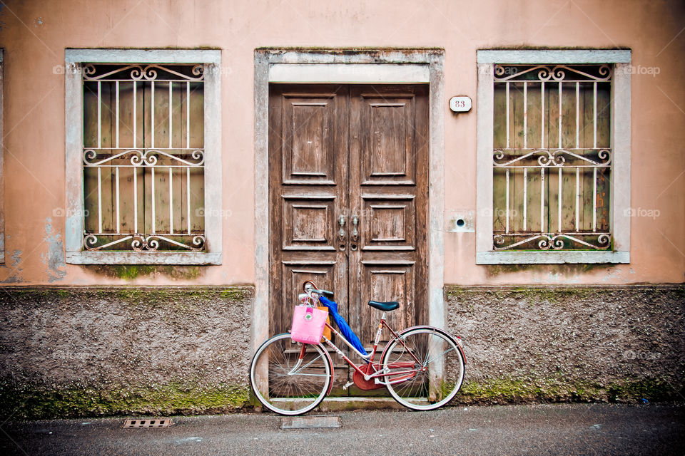 bike parked outside door entrance