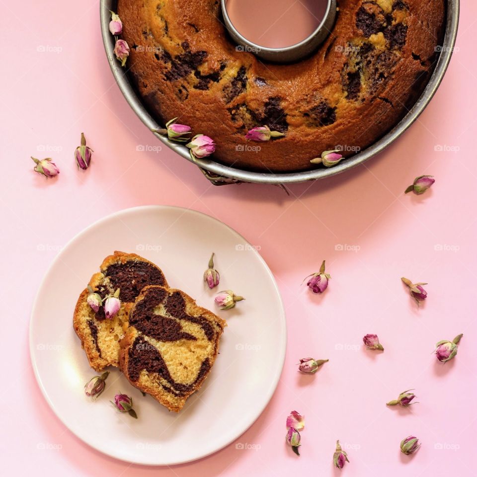 Cake from above. Pink backdrop.