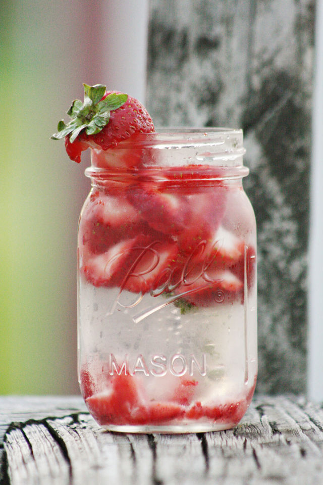 Strawberries fresh in a glass of water