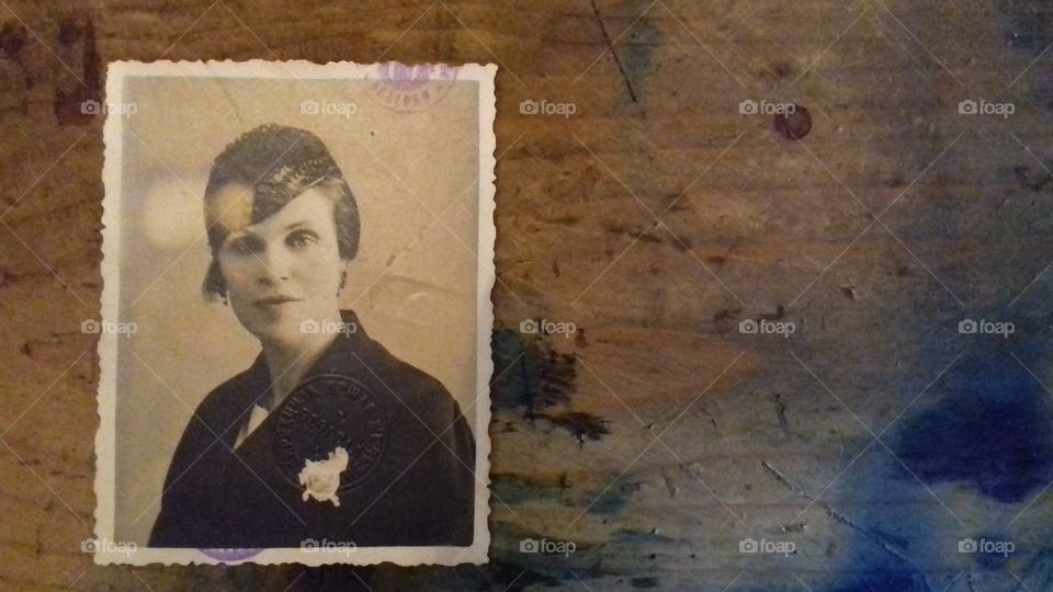 old photo of elegant lady vintage retro style 1920s on old furniture immigration passport fashion