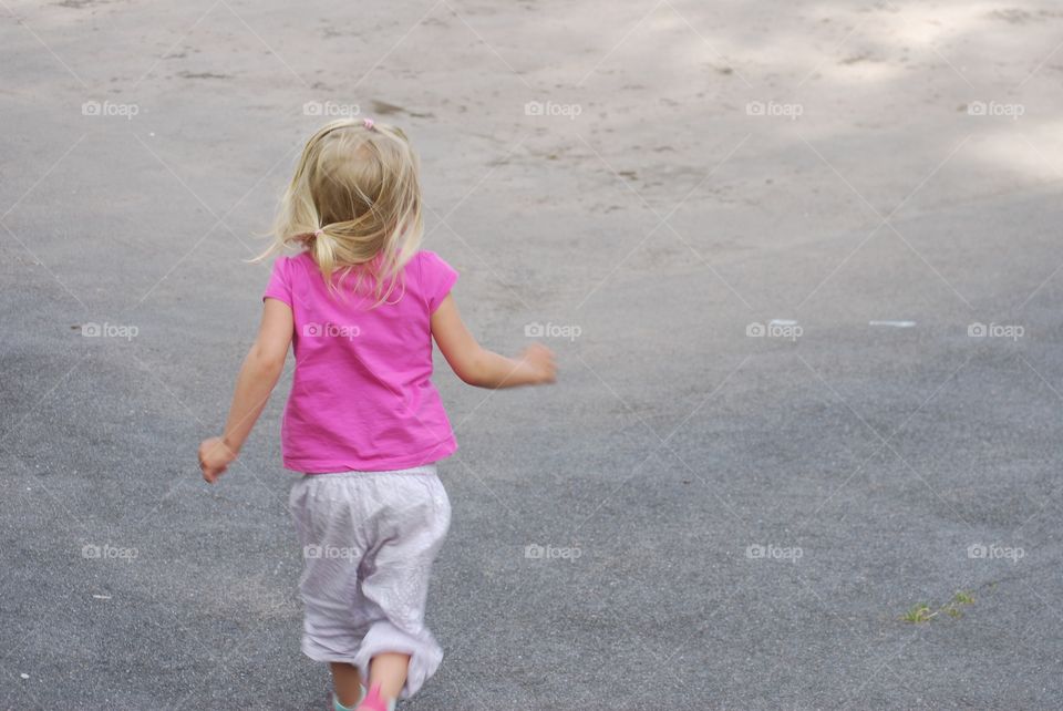 Girl running on Street