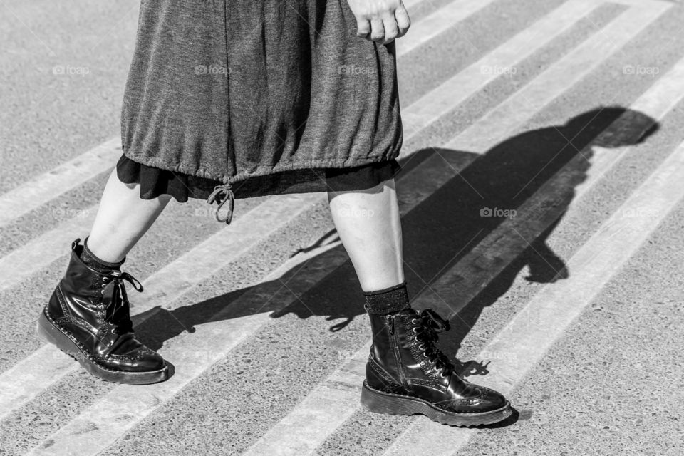 Woman crossing the street