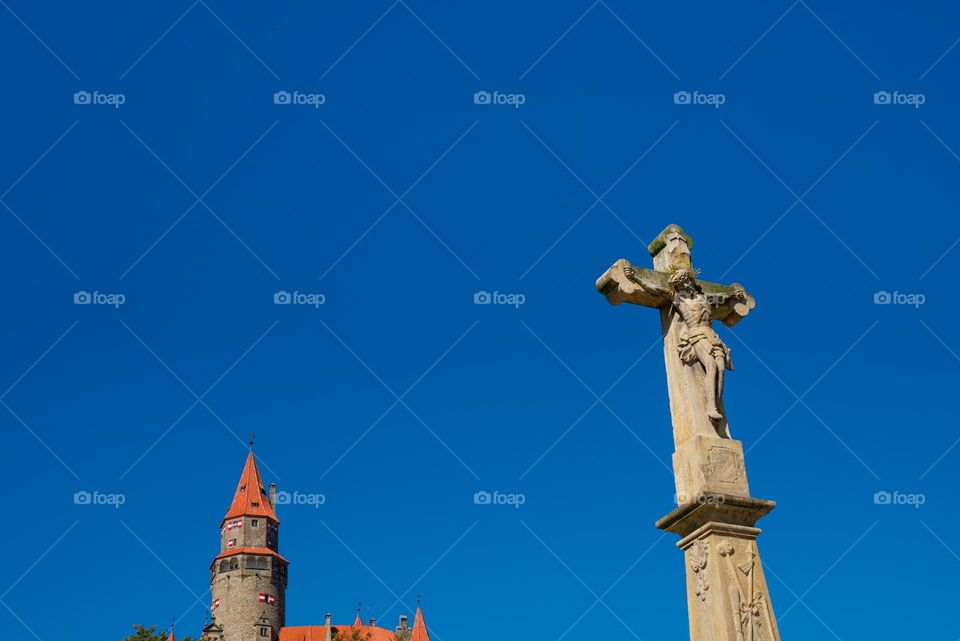 Cross in the background with the famous Czech castle Bouzov.