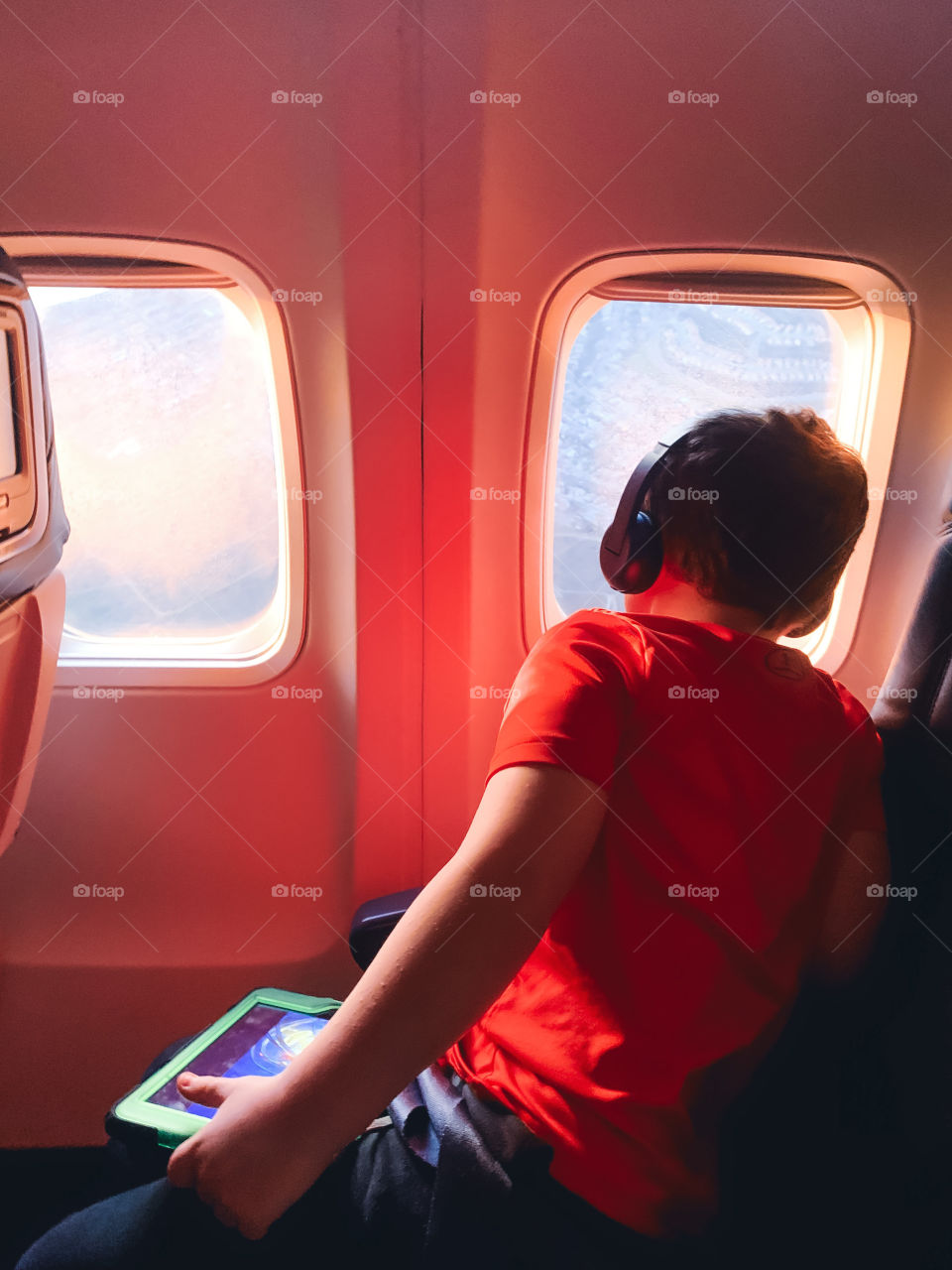 Looking out the window of an airplane 