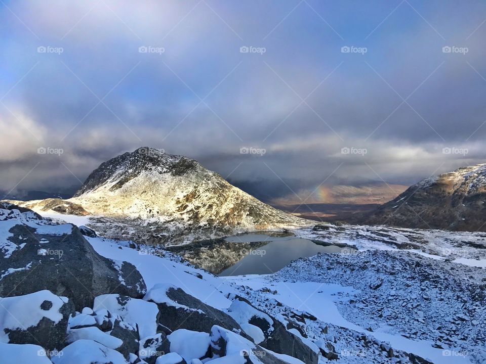 Mountains, hights, snow and the rainbow. 