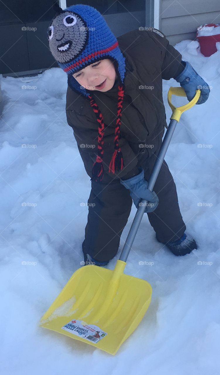 Shoveling snow off the deck 