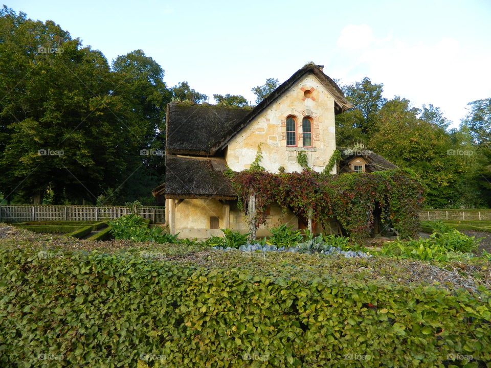 Cottage with Garden. Taken in the Marie Antoinette Village in Versailles, France. 