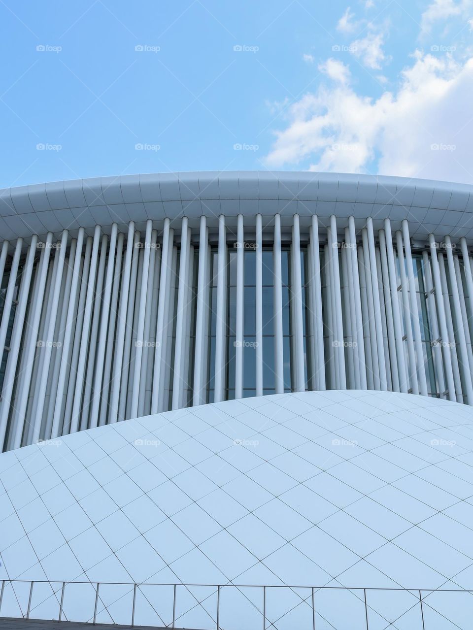 Beautiful white modern philharmonic building with rhythmic geometric stripes in Luxembourg City in Europe, side view closeup