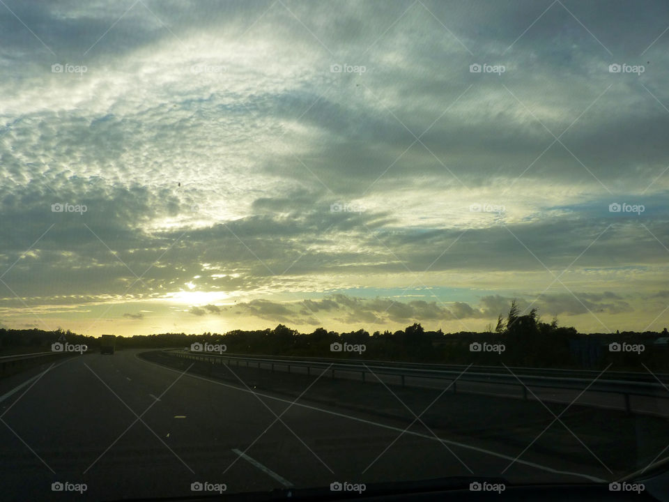 sunset motorway cloudscape by lizajones