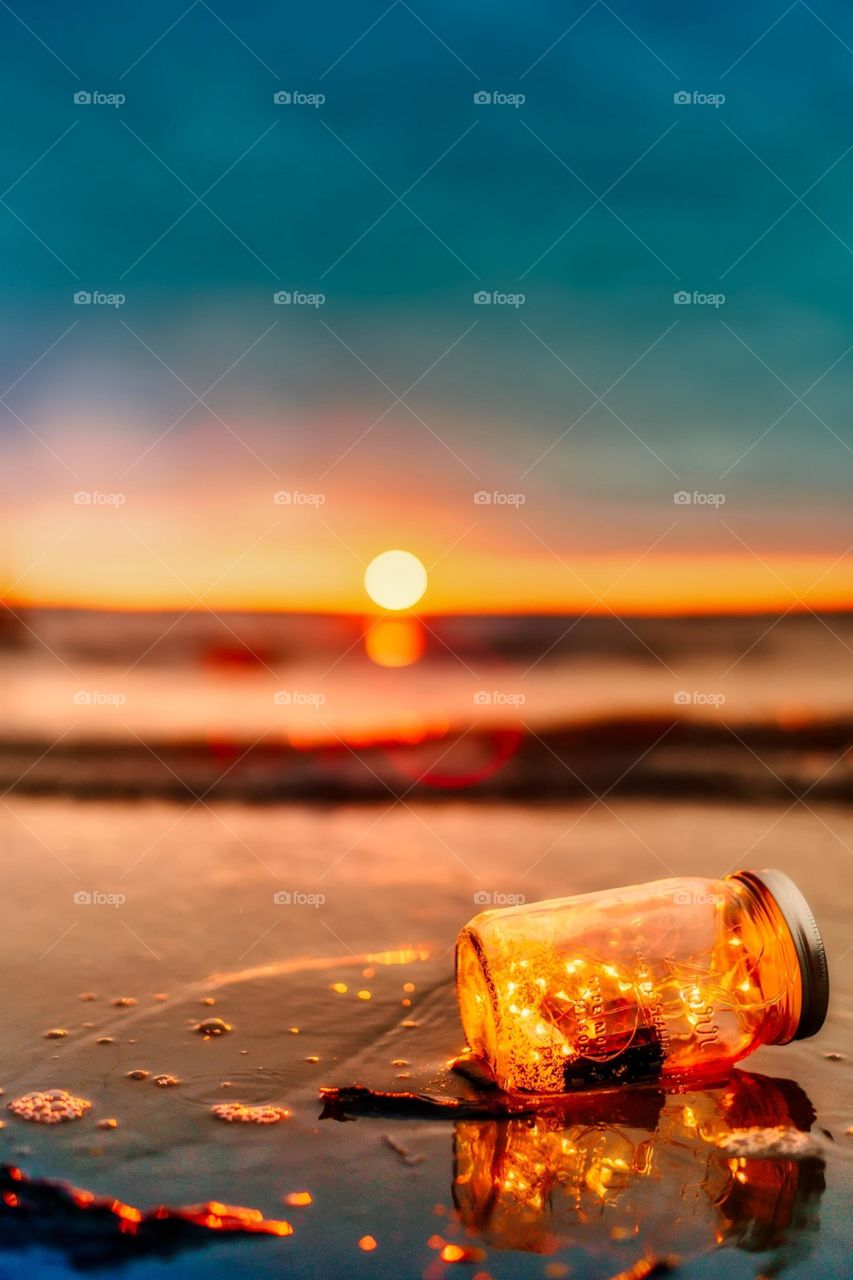 Bottle-ocean sunset persperctive
