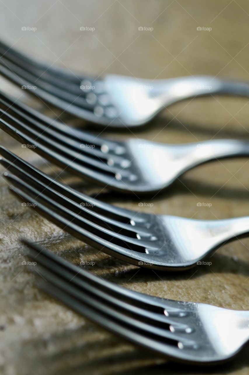 Lined up forks