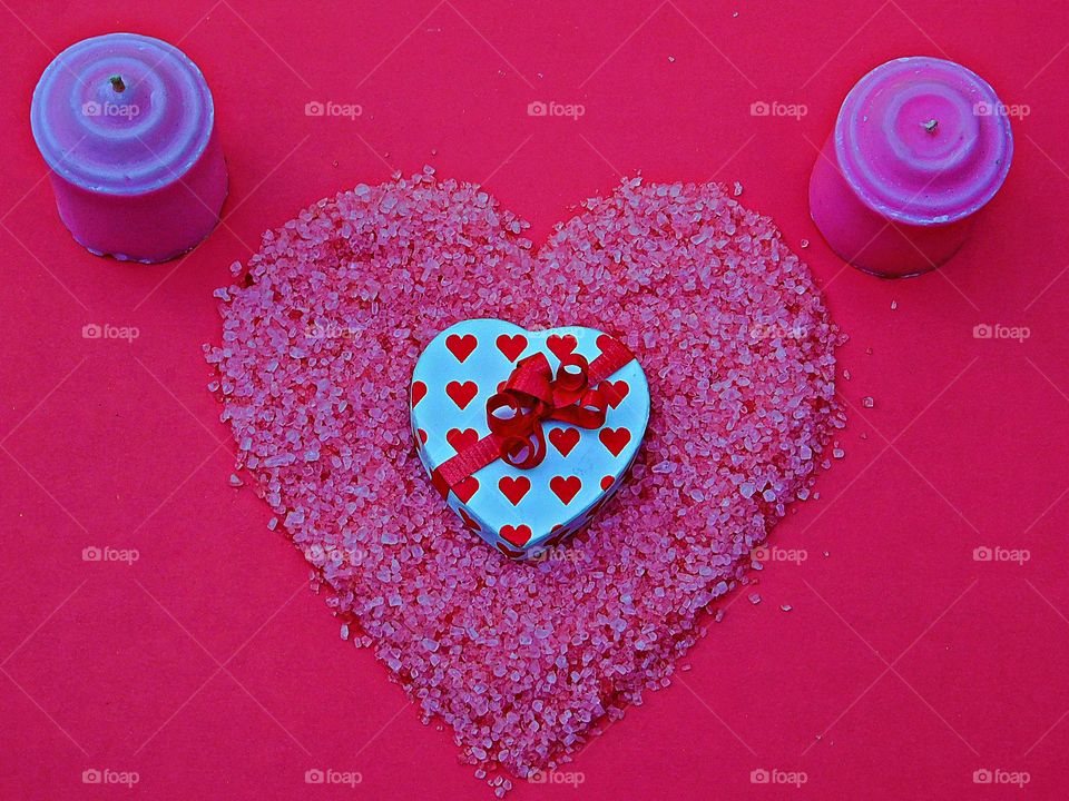 The best known, universal symbol of love is the heart-shaped ideograph, and it symbolizes the core of romantic love, affectionate emotion and caring.