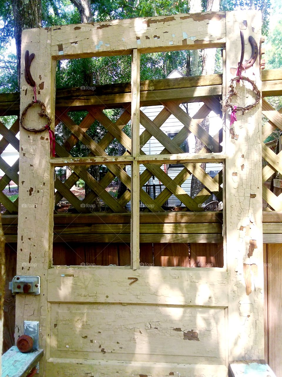 old door repurposed as coat rack and bench