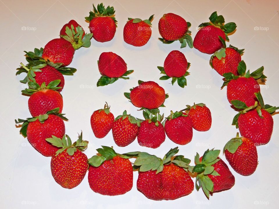 Fruit - Strawberry face -Strawberries are packed with antioxidants like flavonoids, ellagic acid, and phecloseup, berry, large, sweet, delicious, natural, healthy, vibrant, vivid, radiant, freshly picked, field, agriculture, colorful, raw, 