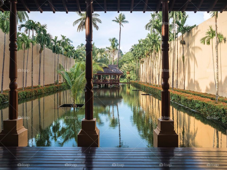 A tropical design courtyard with tranquil pool and a floating gazebo in Langkawi, Malaysia