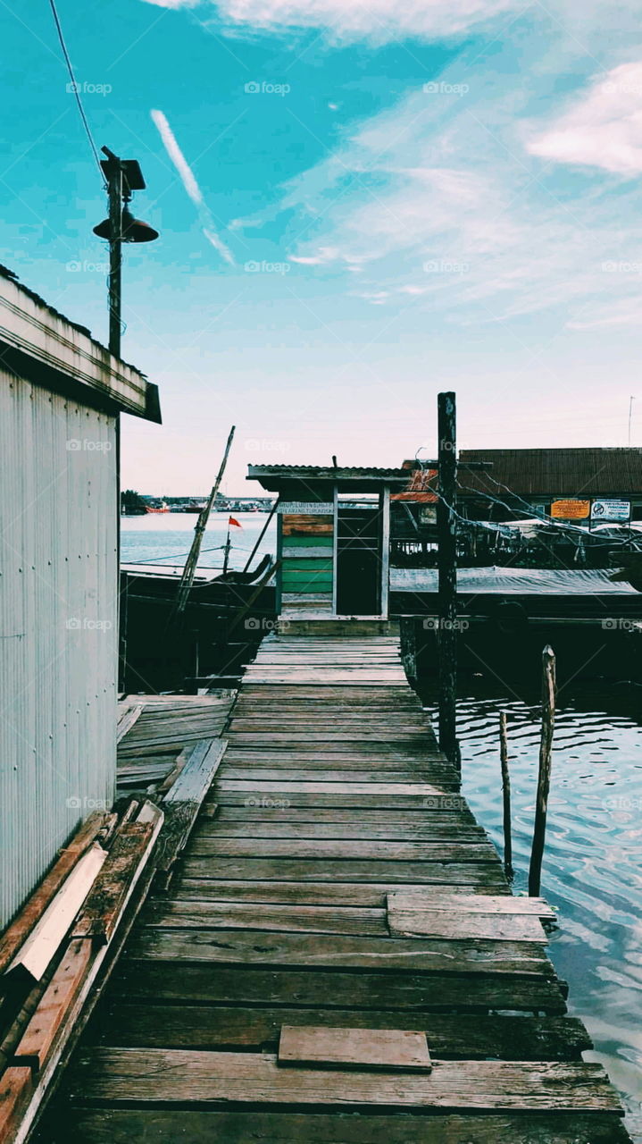 Old little house near lake